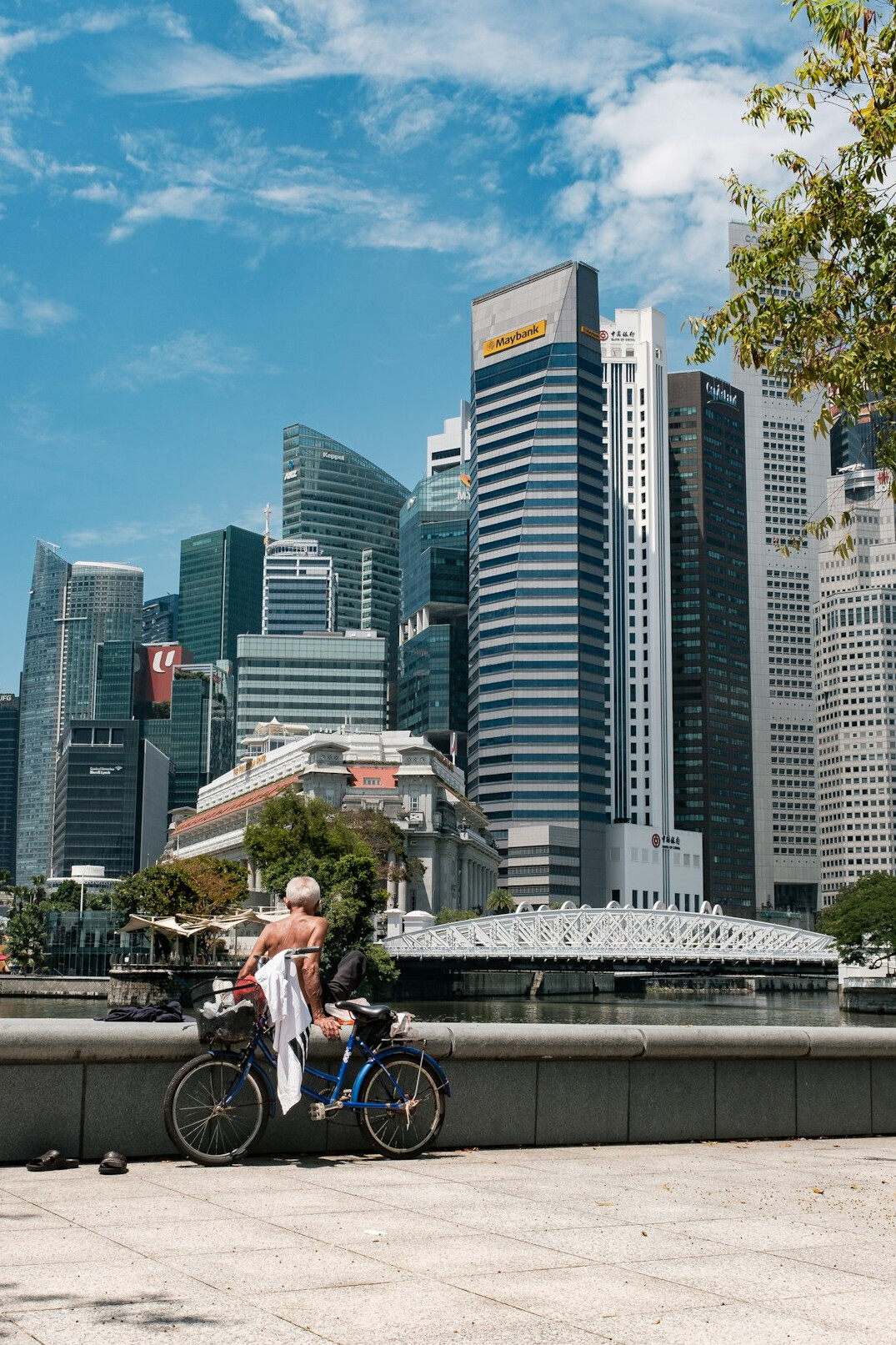 Corporate health consultant reviewing wellness results with an office employee in Singapore